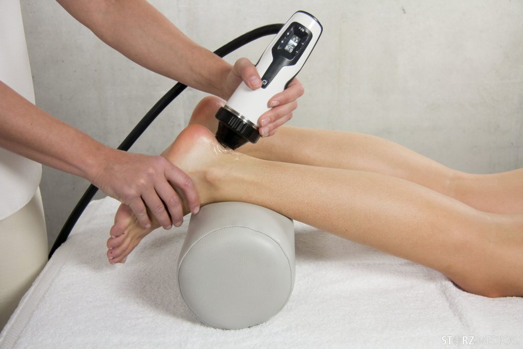 shockwave therapy being performed on ankle